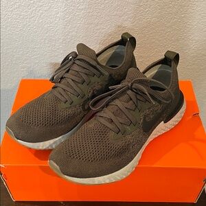 Nike women's Epic React Fly Knit olive and black Sneaker